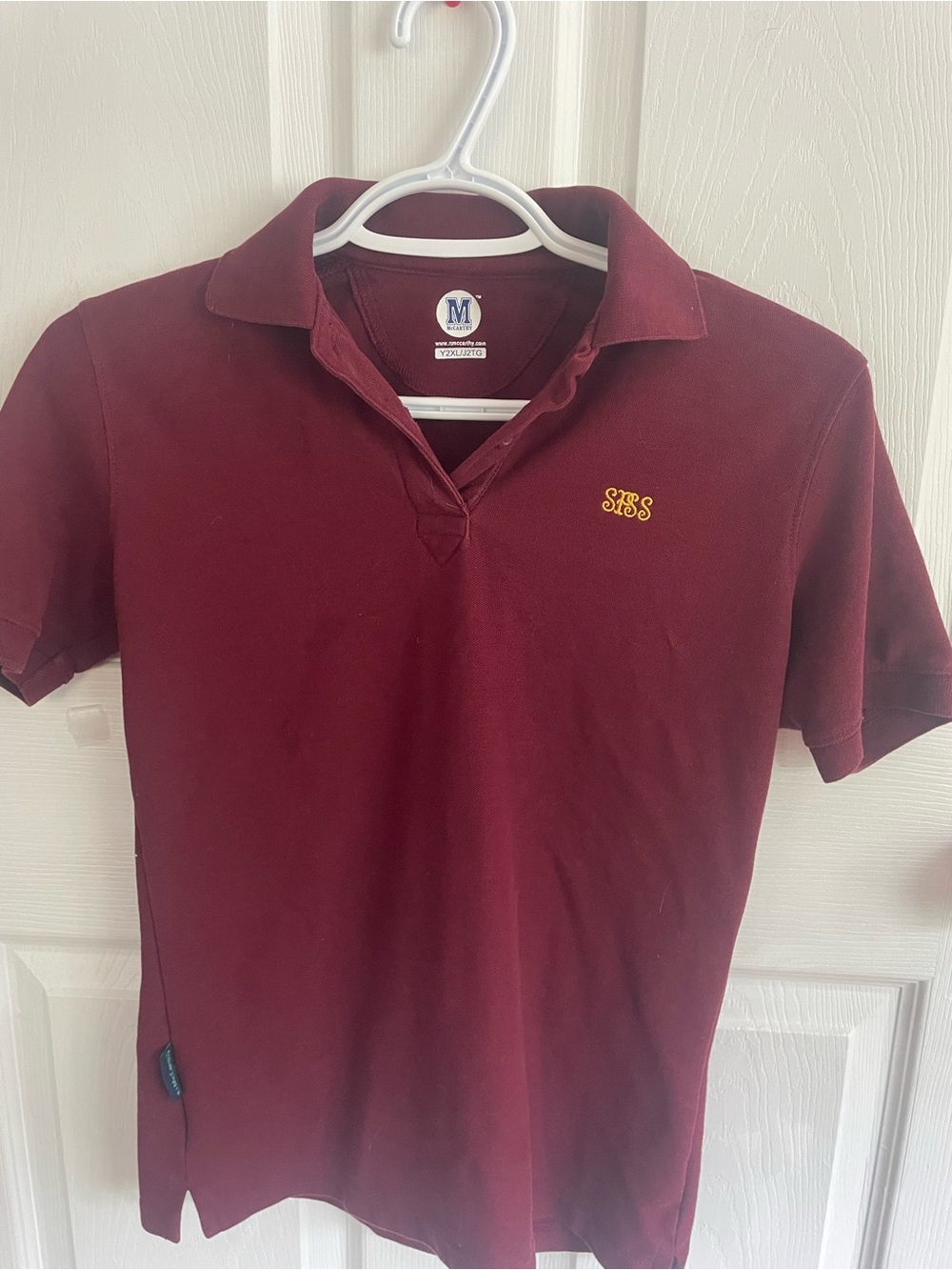 Women's Maroon Polo.uniform shirt for St. Peter’s c.s.s